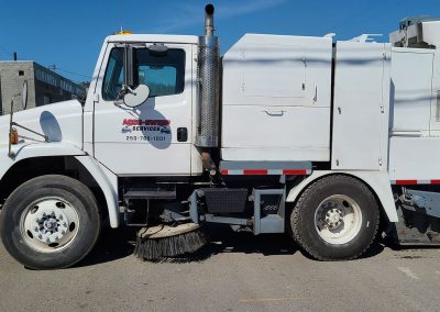 sweeper in parking lot